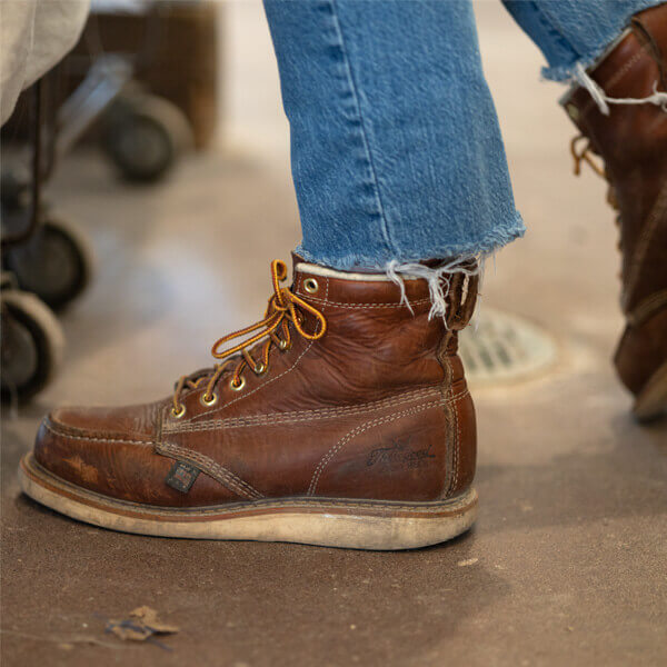 Image of American Heritage 6" tobacco moc toe with Maxwear wedge boots on a person