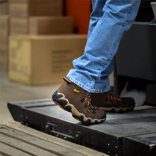 Image of Crosstrex series, waterproof 6" brown safety toe Hiker boot on a person