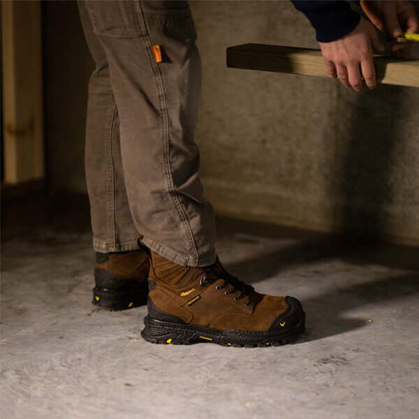 Image of infinity FD series 8" studhorse insulated waterproof safety toe boot on a person