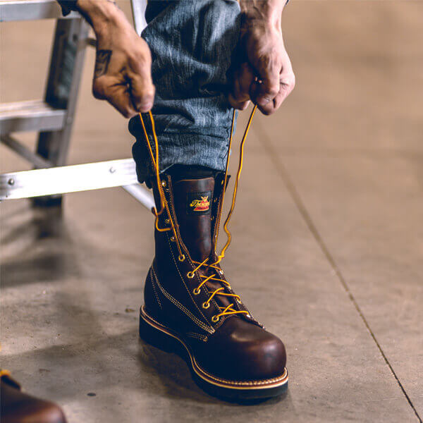 Image of Emperor toe 8" briar pitstop work boot on a person
