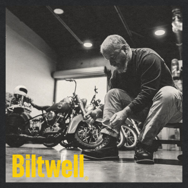 Image of Bill from Biltwell lacing up his boots