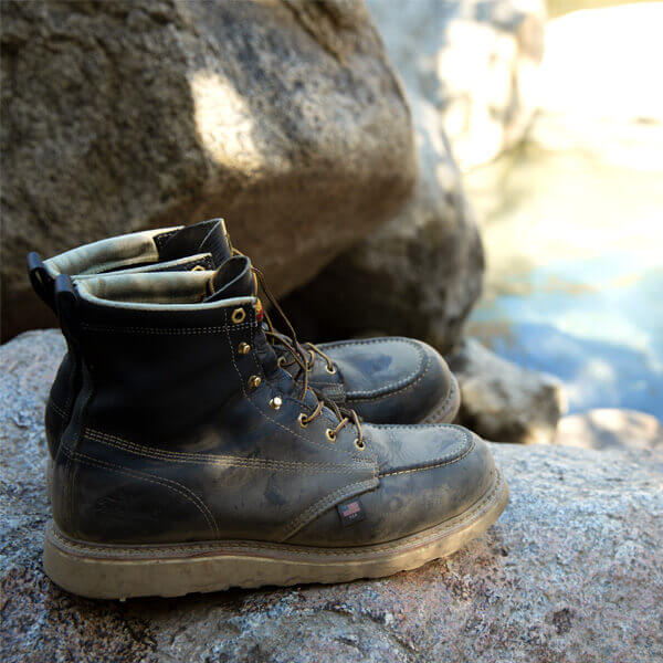 Image of empty American Heritage 6" black safety toe, moc toe with Maxwear wedge boots
