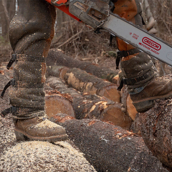 Image of logger series 9" studhorse waterproof boots worn by a man