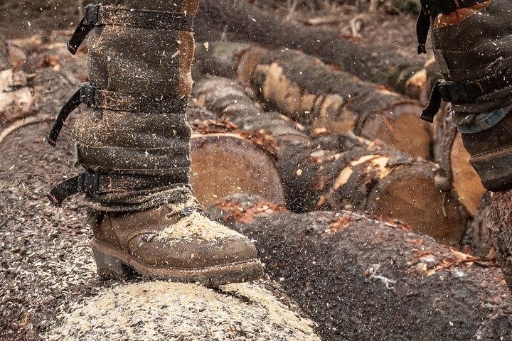 Man wears Logger series waterproof work boots to help prevent athlete's foot.