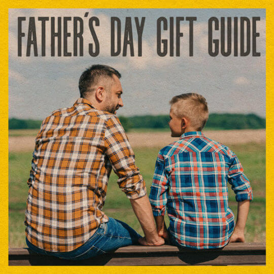Image of a father and son sitting together for the Father's day gift guide blog post