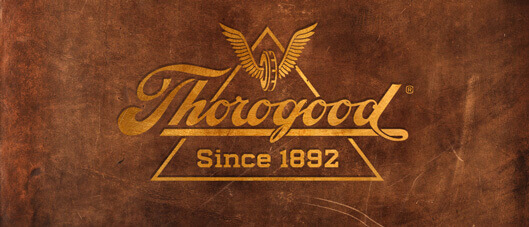 Image of the Thorogood logo on a leather looking background