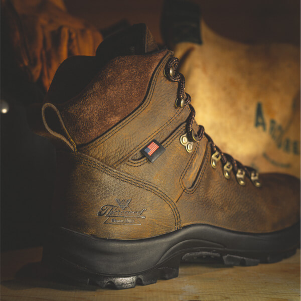 Close up image of the American union series waterproof 6" brown boot on wood